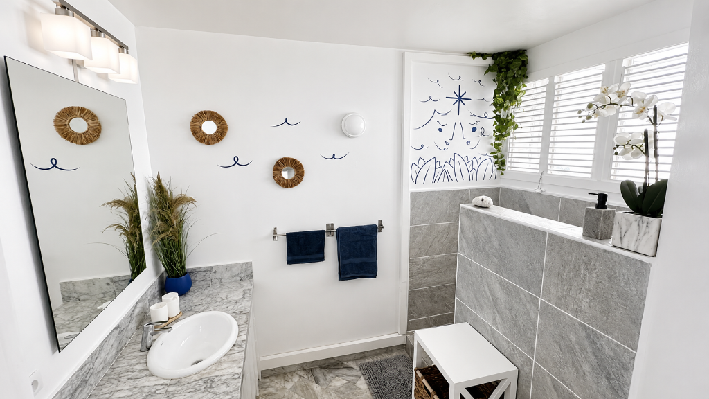 Douche et espace salle de bain lumineux avec végétation, studio Blanc Bleu